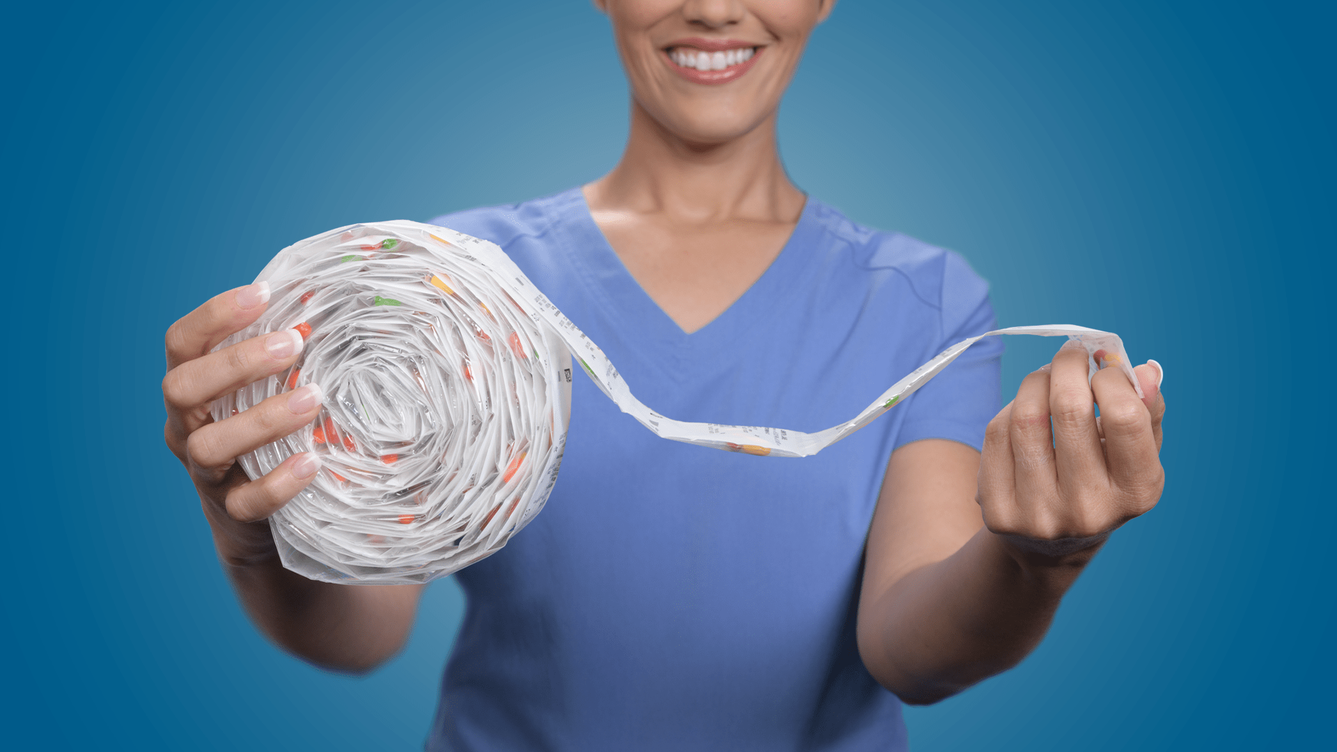In Touch Pharmaceuticals brand photography. Nurse holding pill packet strip rolled up.