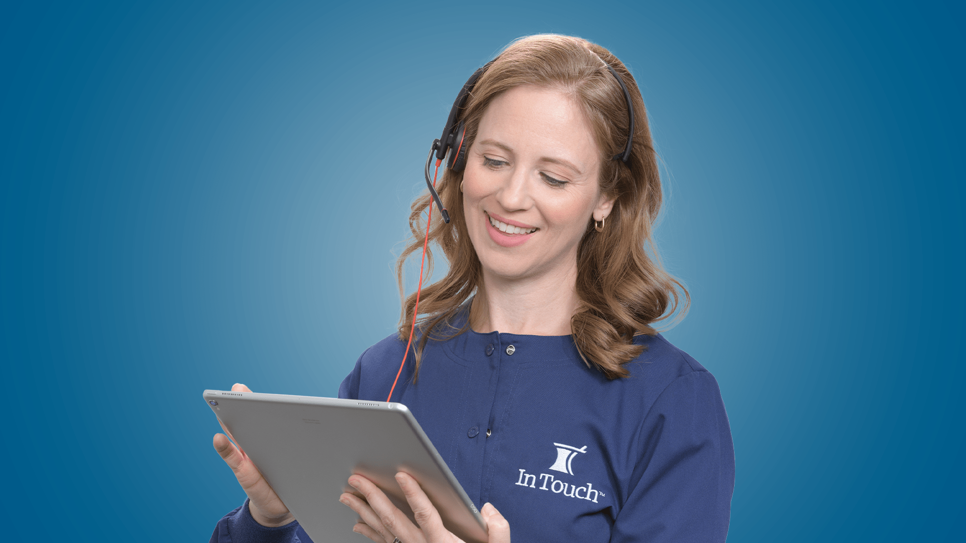 In Touch Pharmaceuticals brand photography. Sales call center operator with clipboard and headset.